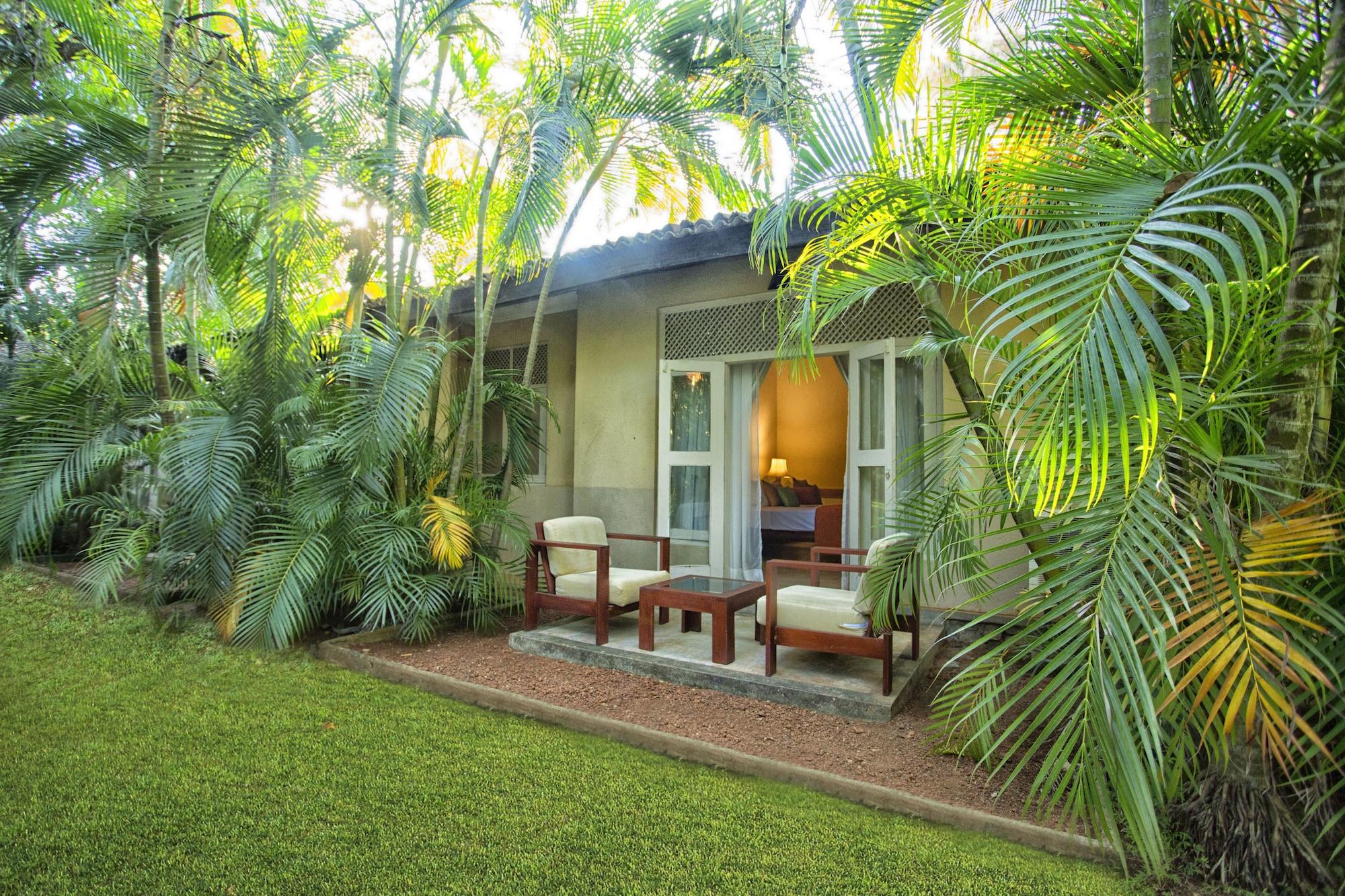 Hotel Sigiriya Exterior foto A villa at the resort