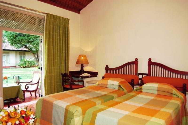 Hotel Sigiriya Quarto foto A room at the hotel
